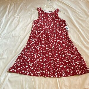 This Old Navy (NWT) dress is deep red with a floral print in a size large.